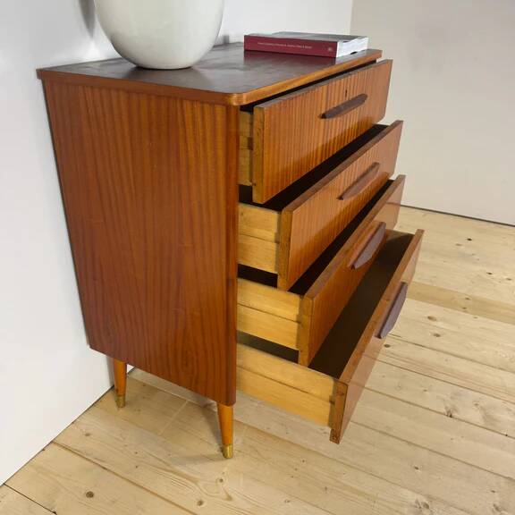 Danish mid-century chest of drawers with four teak drawers.
