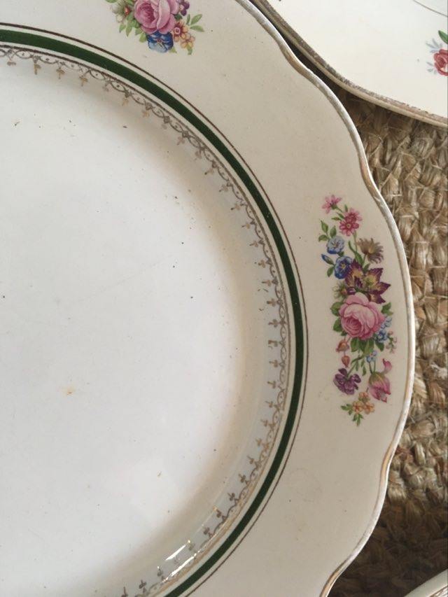 Old plates with matching flowers