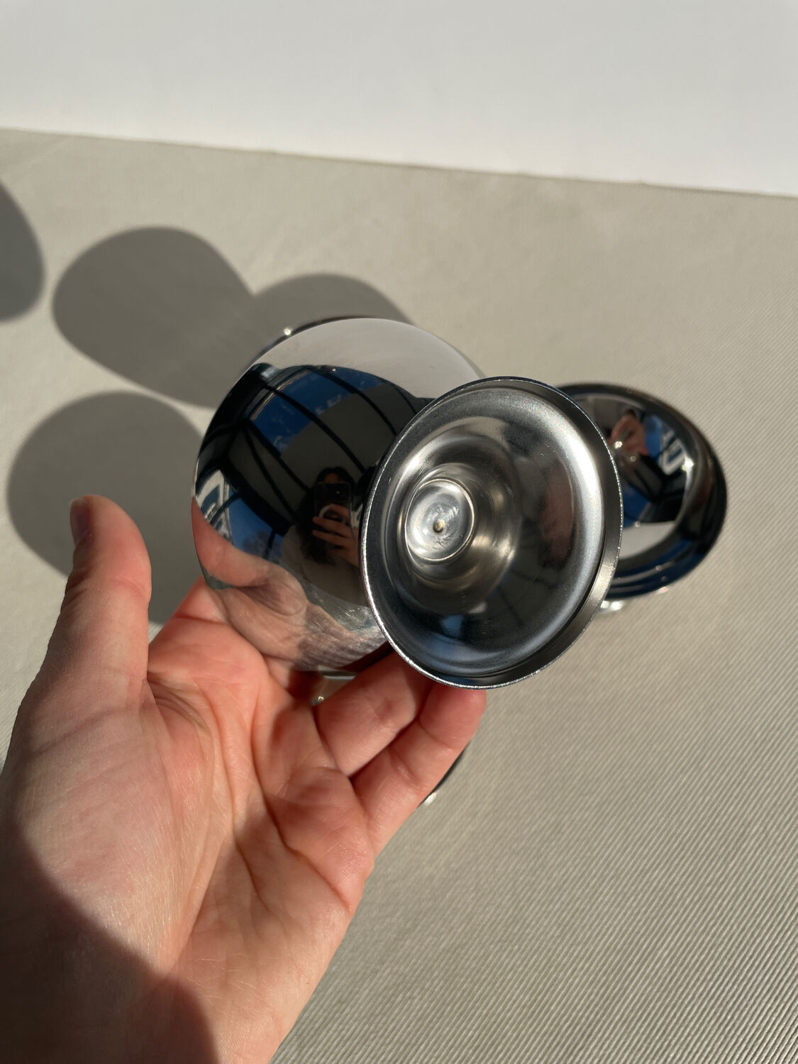 Set of 4 metal glasses / vintage stainless steel ice cream cups on a stand.