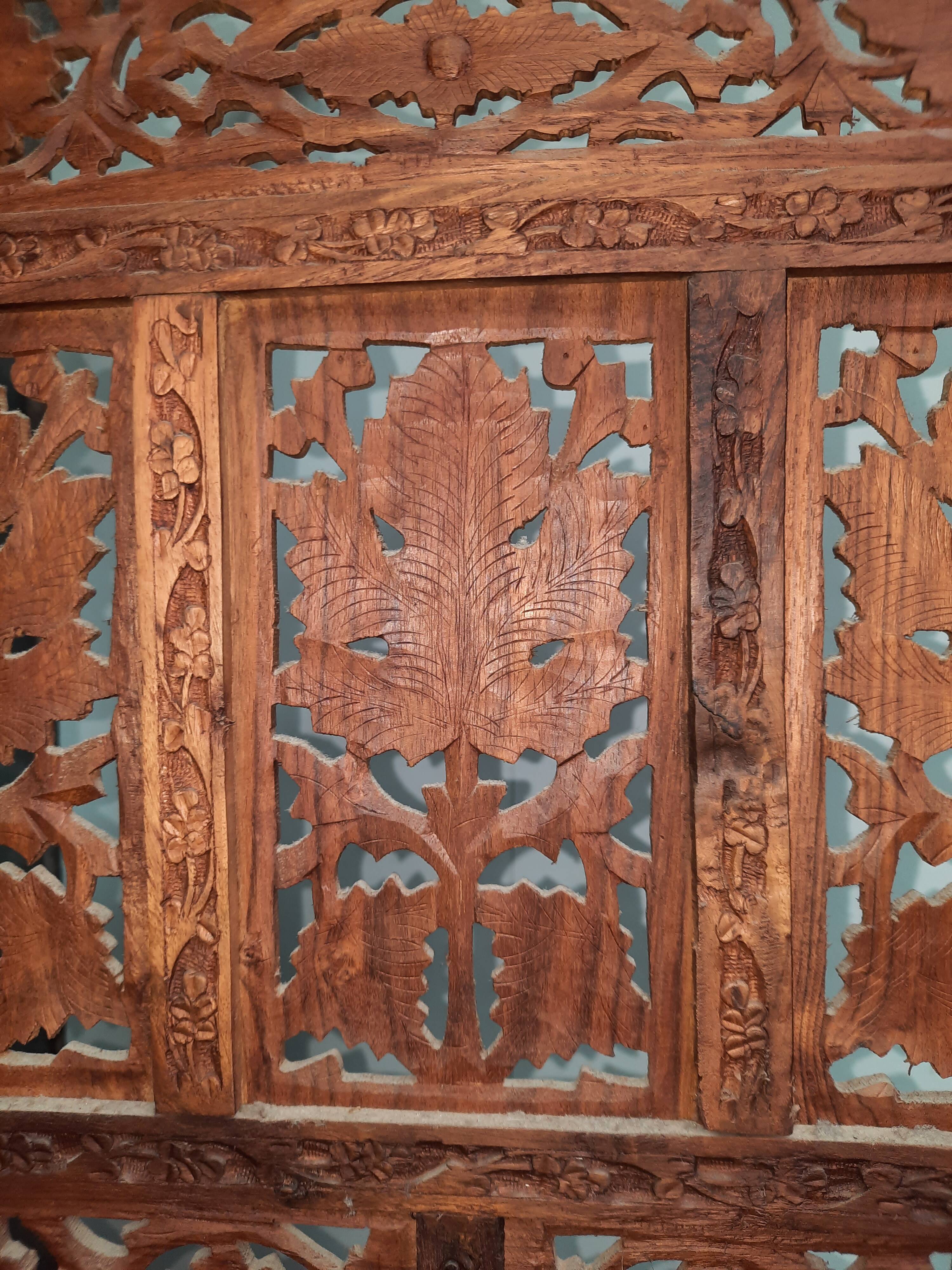 Asian screen in cut-out wood