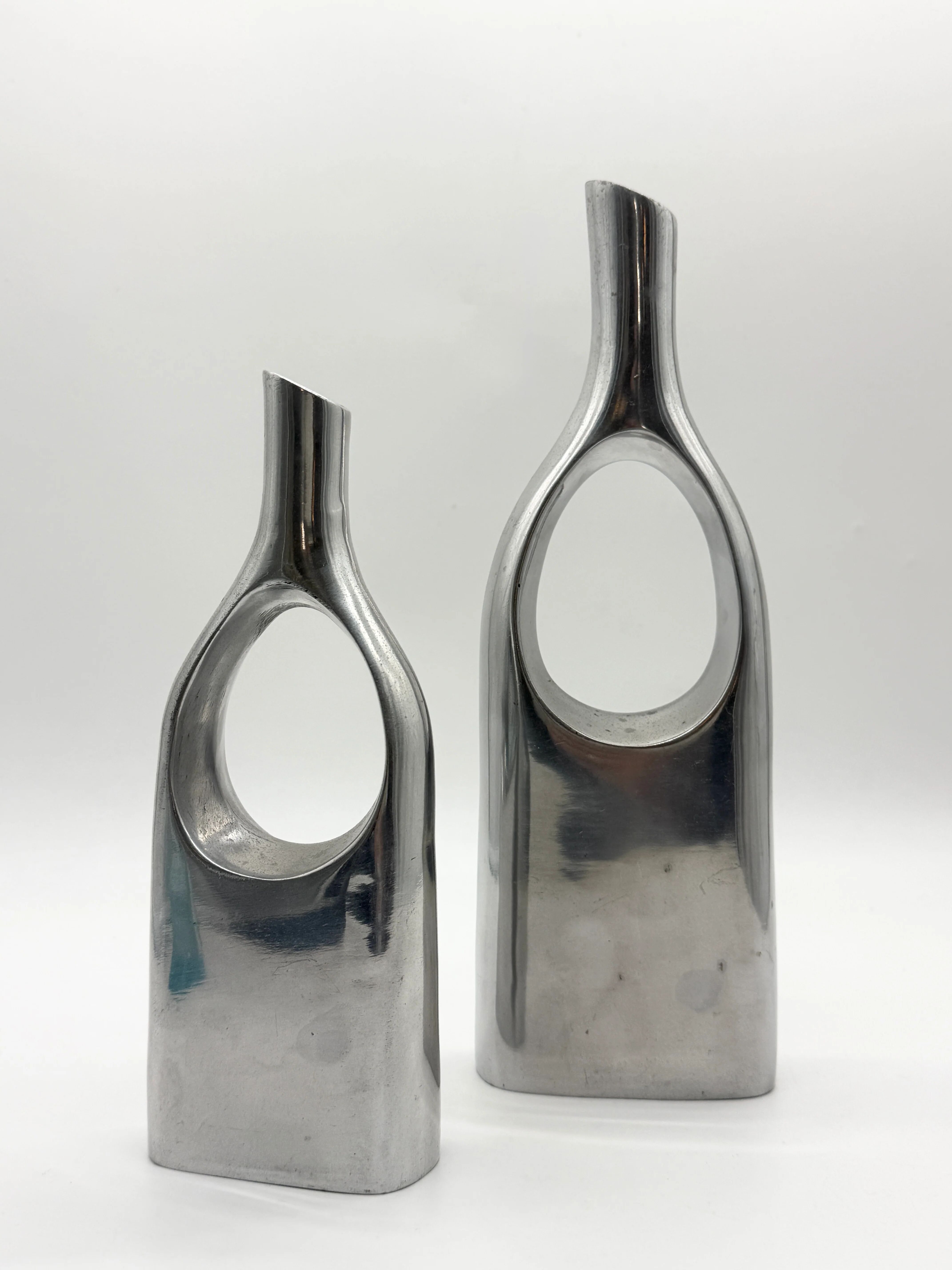 Pair of "drop" vases in aluminium cast, Italy, 1970s