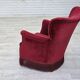Fauteuil danois des années 1970, velours de mobilier rouge cerise, pieds en bois de chêne.