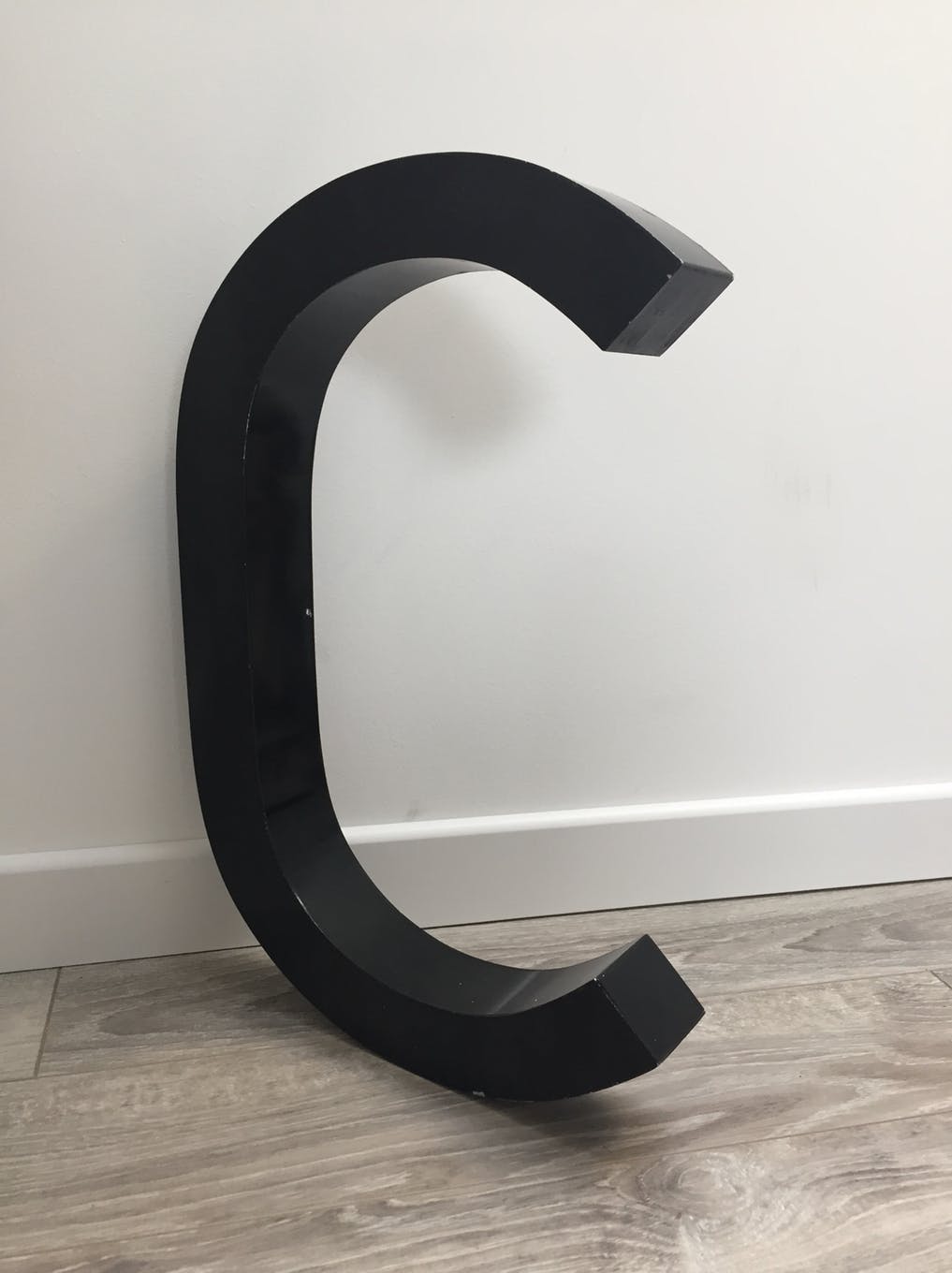 Letter C metal sign
