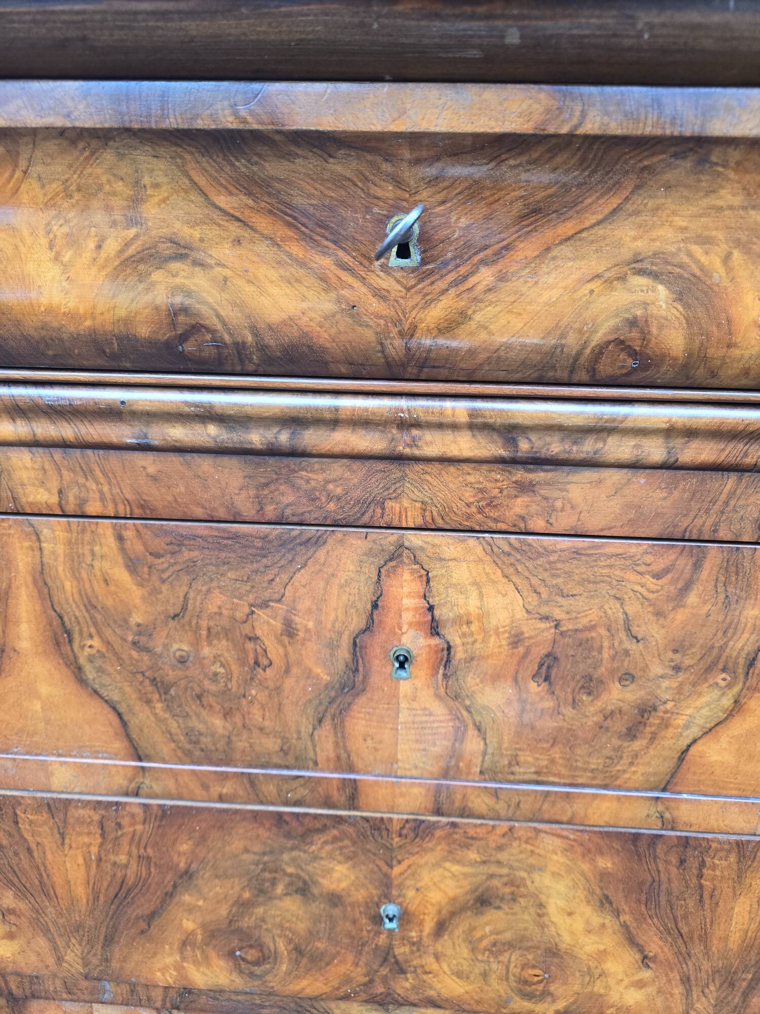 Louis Phillipe chest of drawers in burr walnut and black marble top