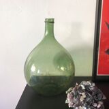 Demijohn old bottle in blown glass