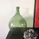 Demijohn old bottle in blown glass
