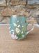 Enamelled glass mug/cup