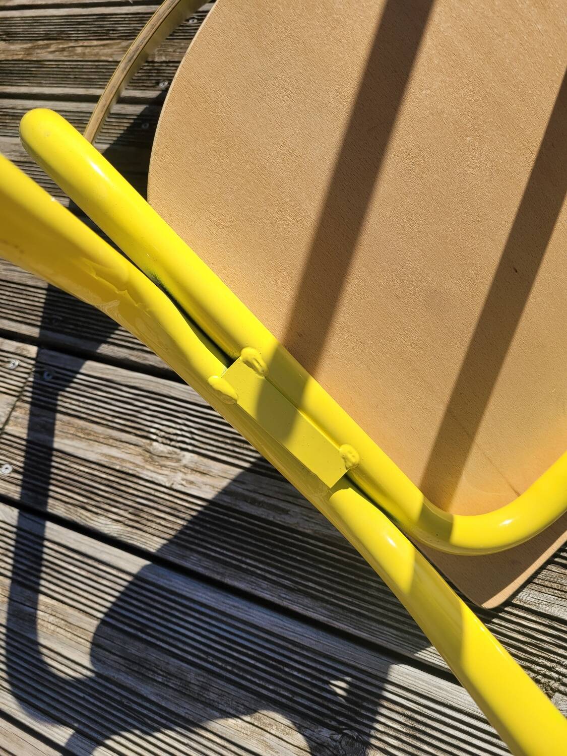 Pair of yellow plywood chairs