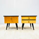 A pair of night cabinets