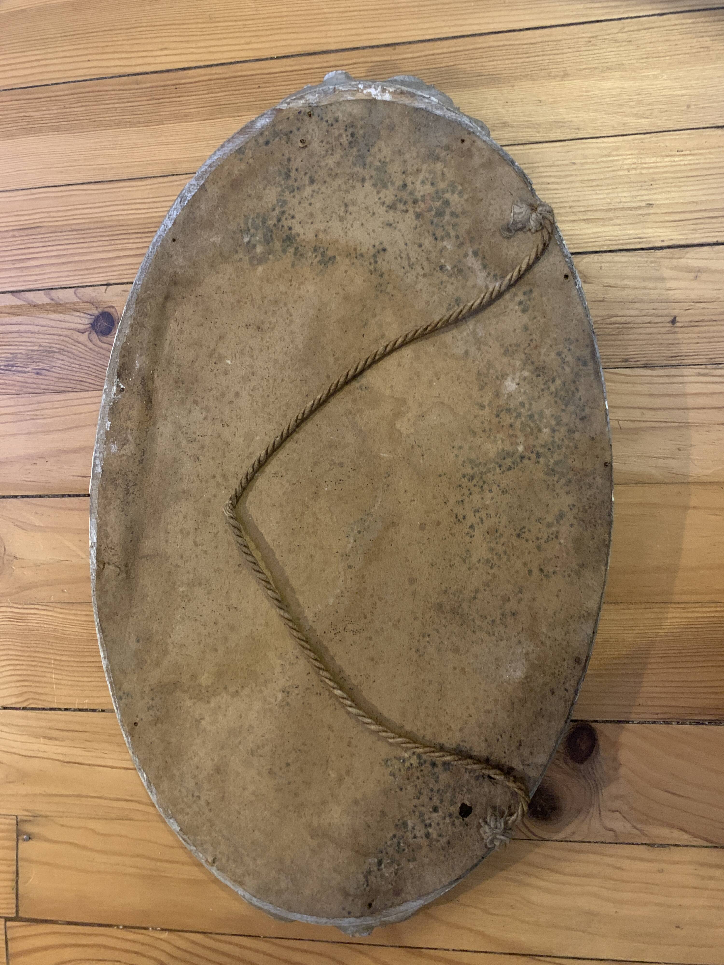 Very old mirror, flower motif frame