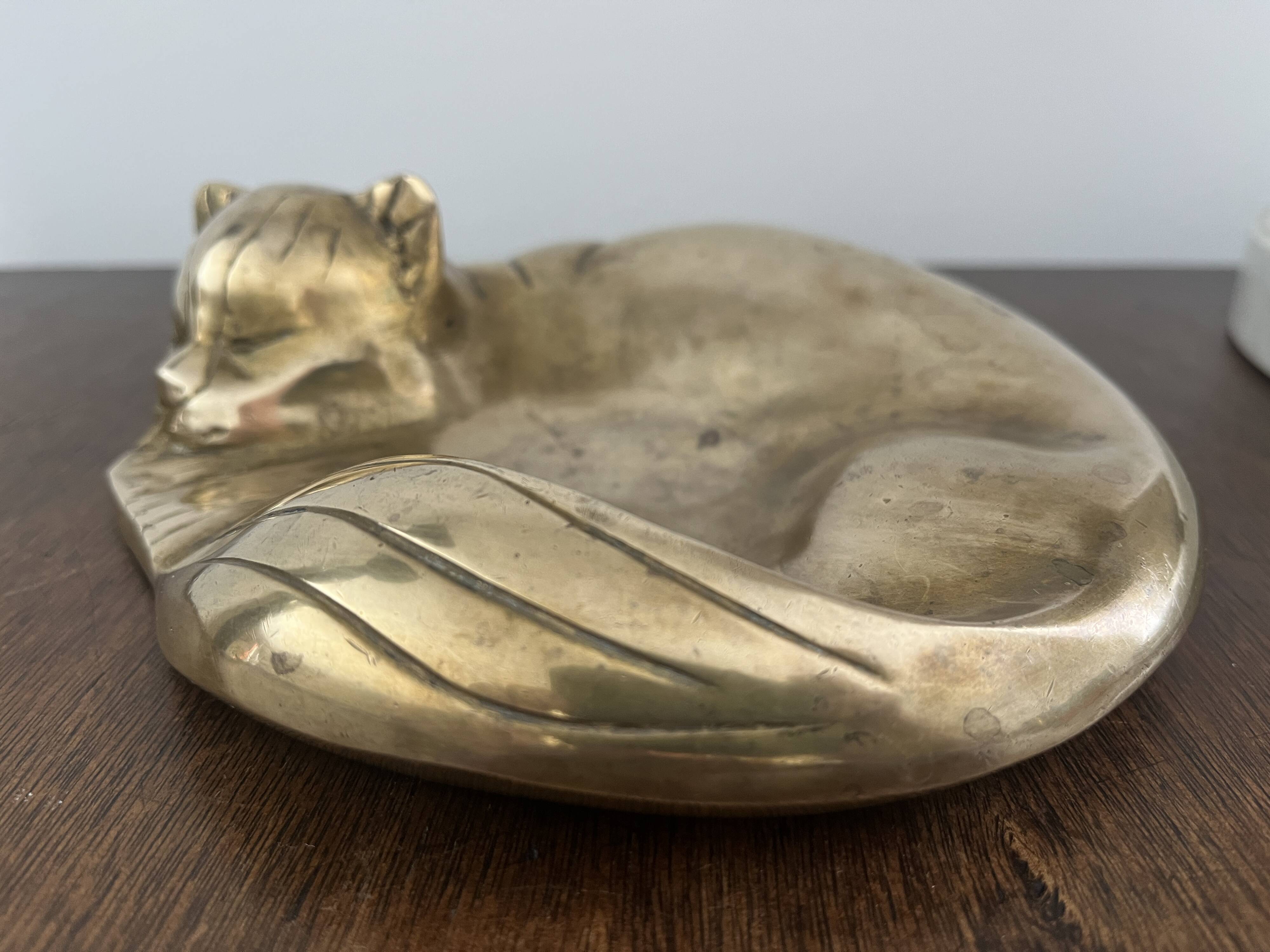 bronze cat emptier from the 1930s