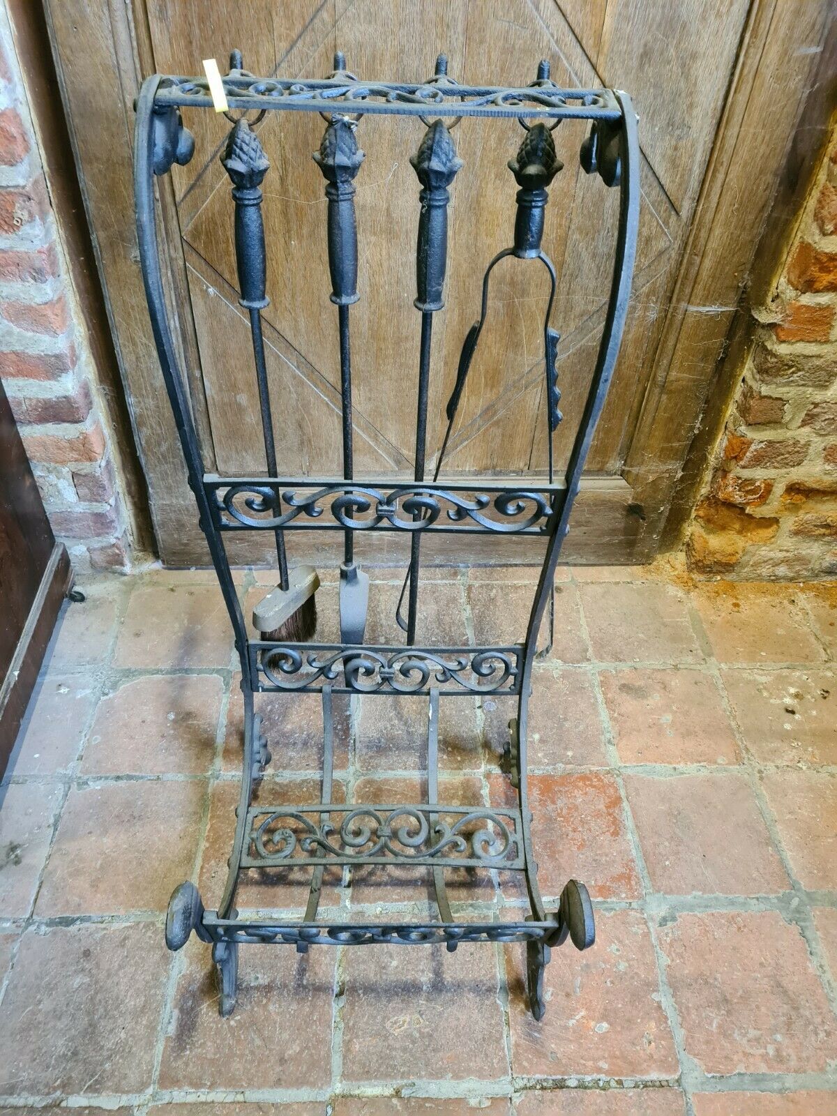 Fireplace, cast iron log holder