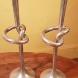 Pair of large cast aluminum candlesticks signed kare design.