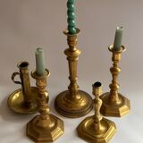 Set of 5 bronze and brass candlesticks