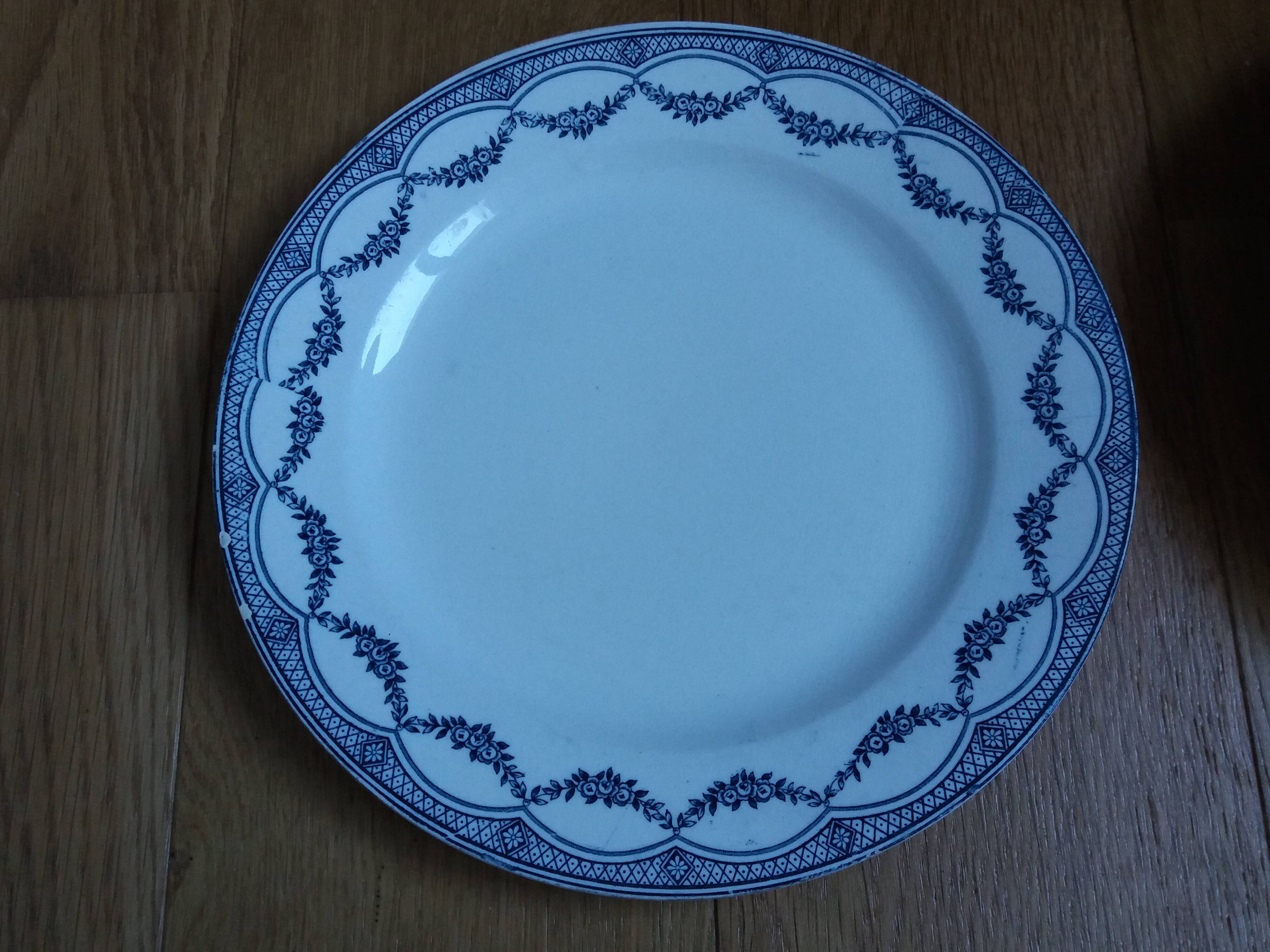 Old green and blue mismatched plates from Digoin, Salins, Moulin des Loups