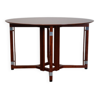 Cette belle table à manger ronde Schuitema au design Art déco du D est proposée.