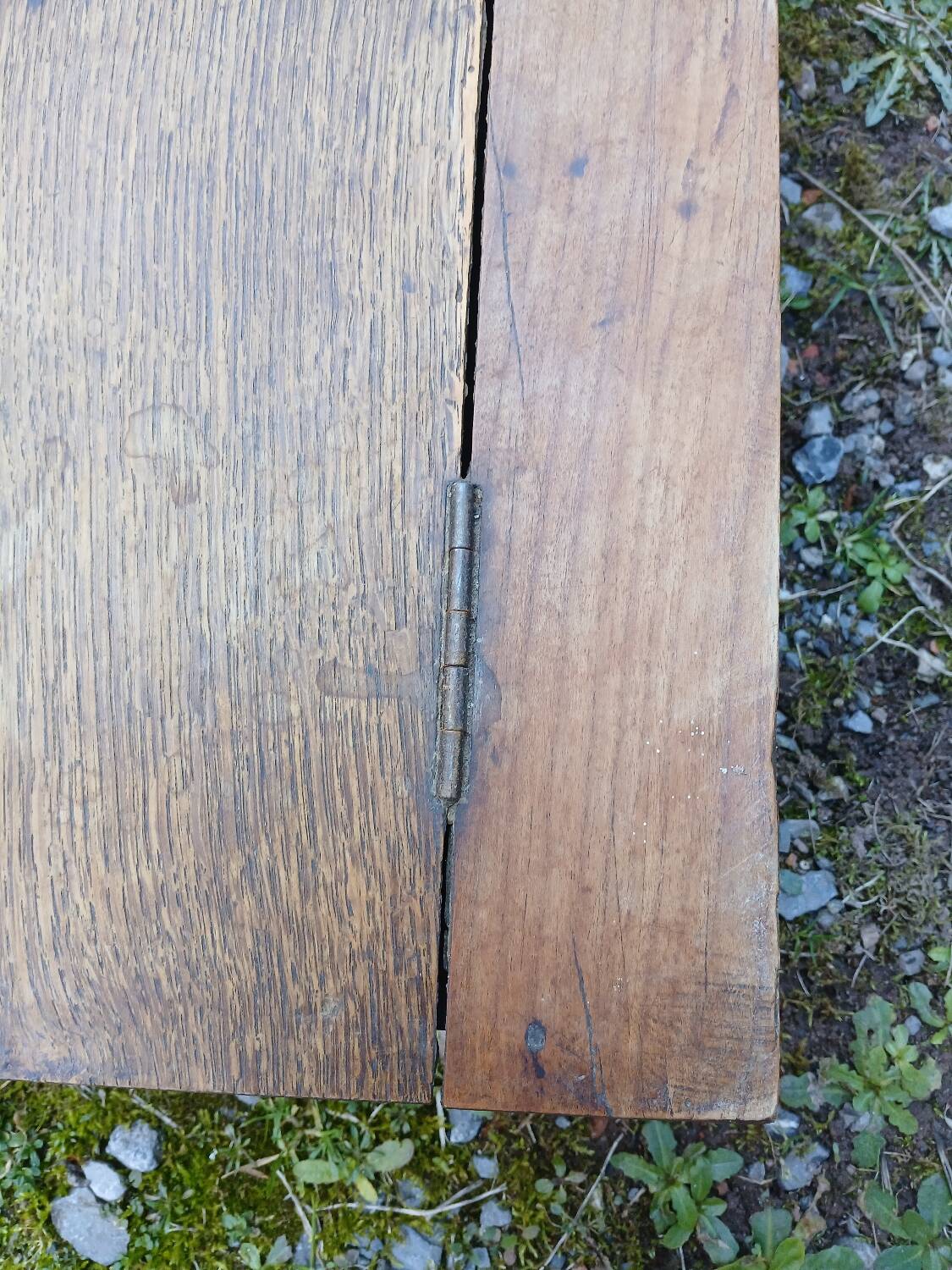 Small old wooden chest with hinged lid
