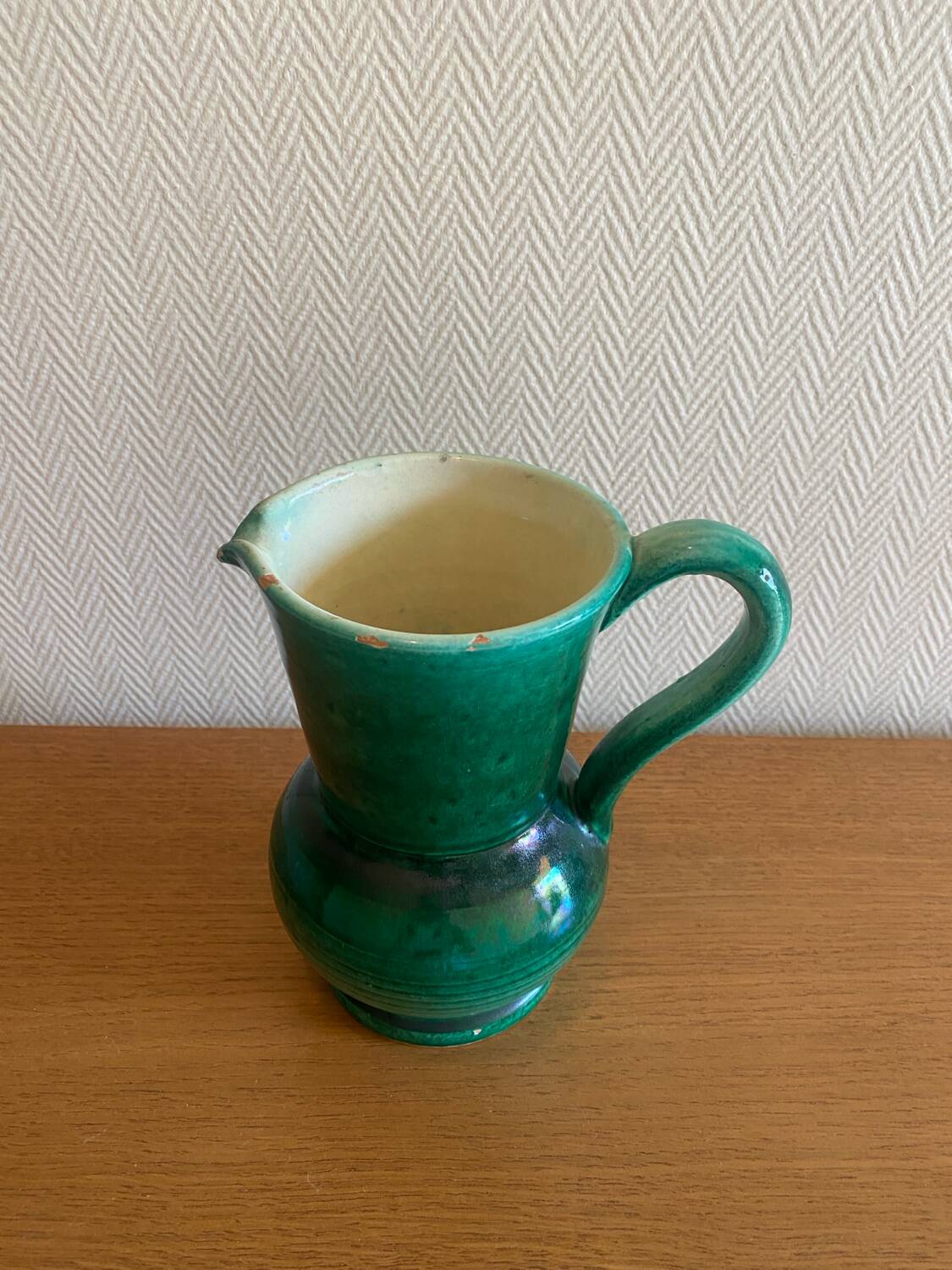 Green glazed ceramic carafe