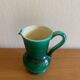 Green glazed ceramic carafe