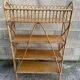 vintage rattan shelf on stand