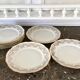 8 white and gold porcelain dessert plates