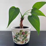 Flower pot with floral decoration in slip