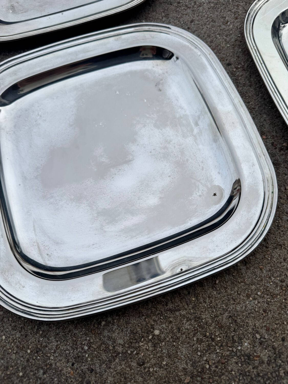 Silver-plated metal underplates from the 1980s.