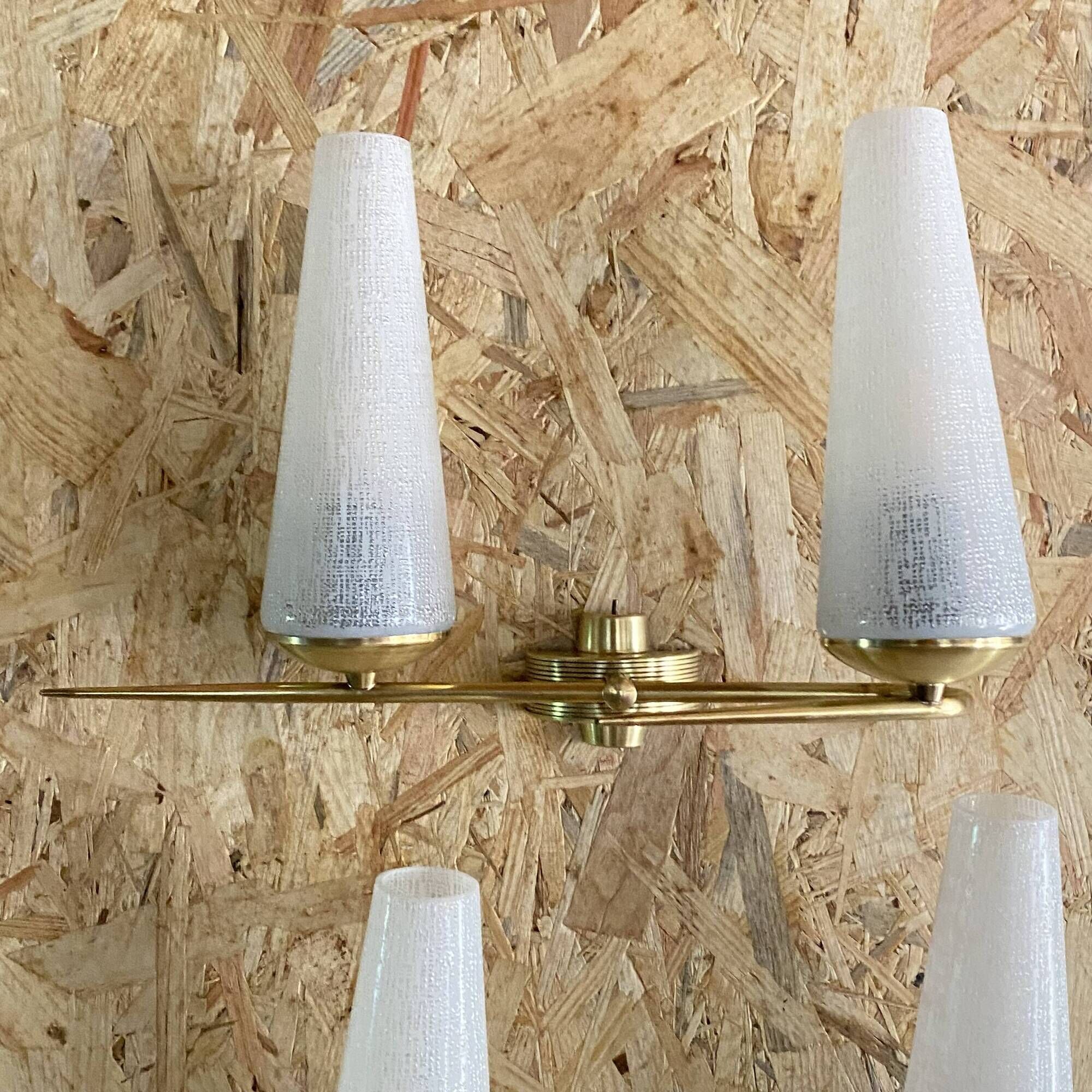 Pair of vintage double wall lights in brass with white ribbed glass tulips.