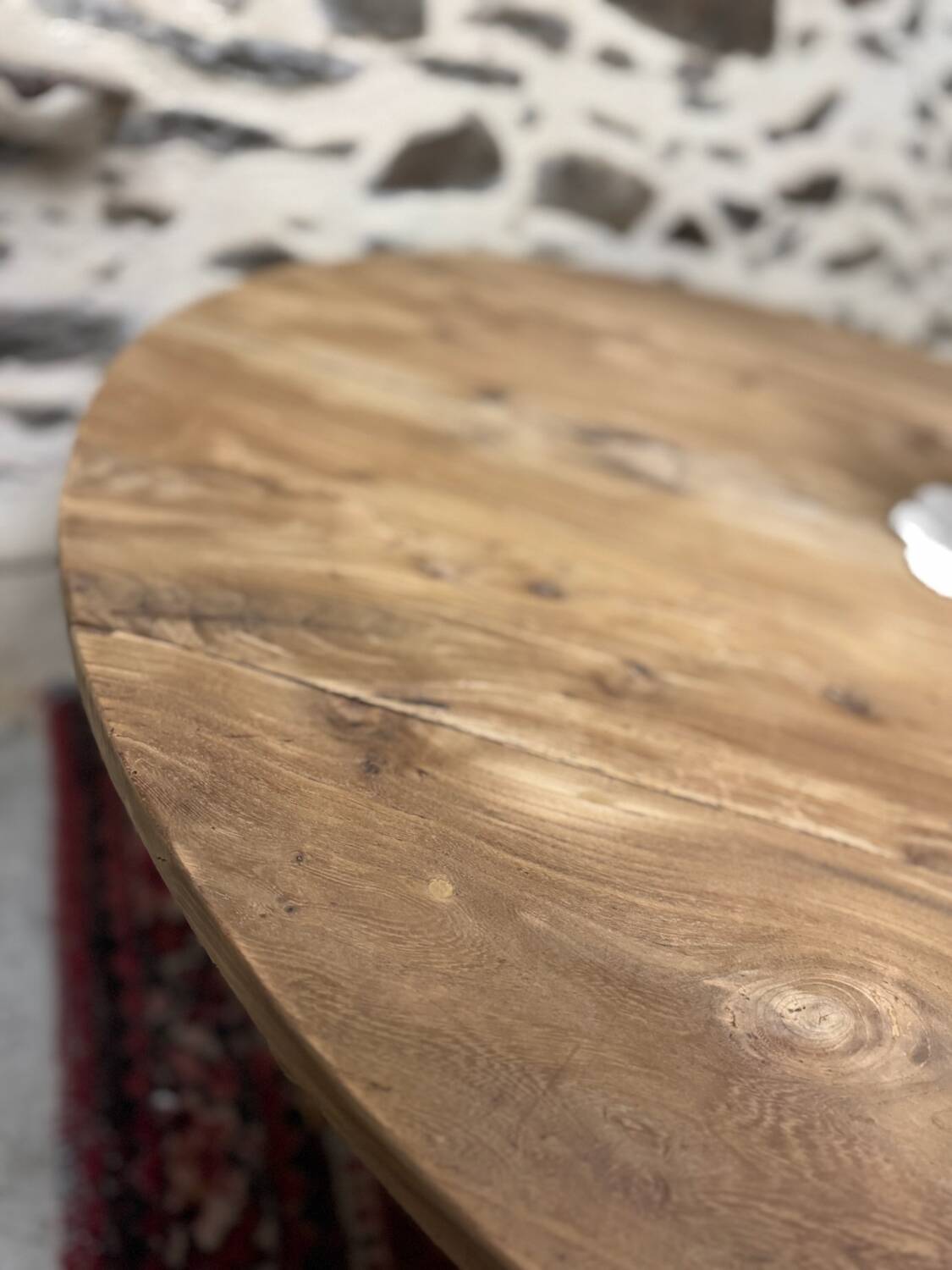 Oval coffee table in raw wood