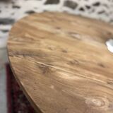 Oval coffee table in raw wood