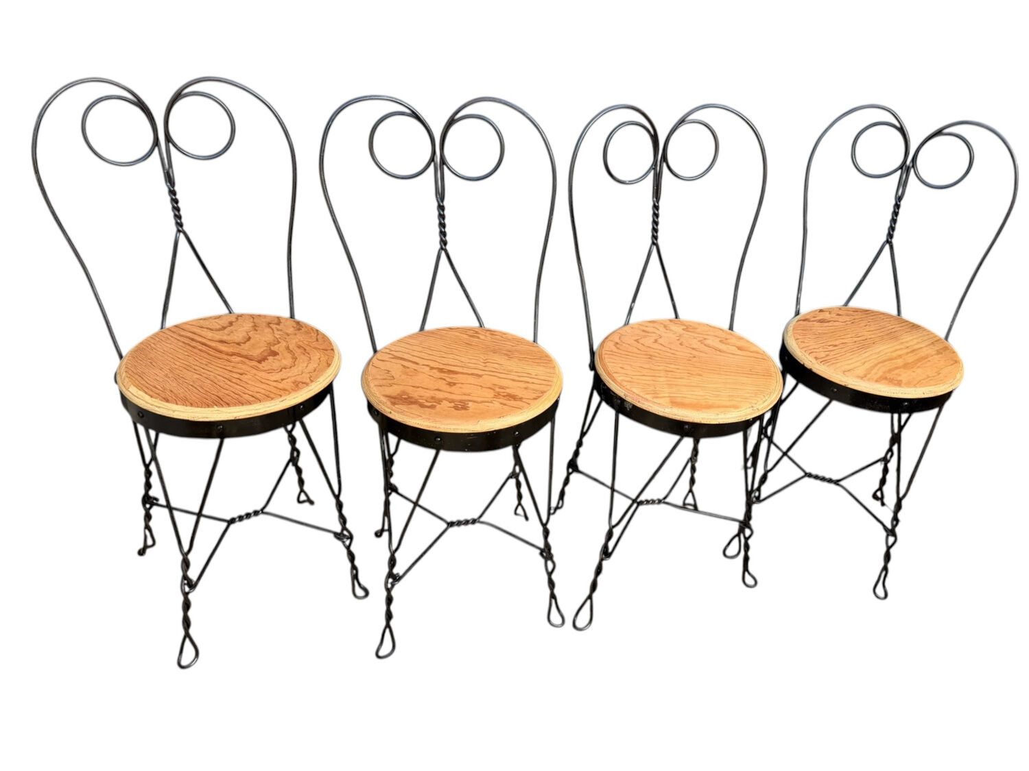 Set of 4 vintage wrought iron chairs from the 1940s.