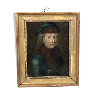 Portrait of a woman in a fur cap