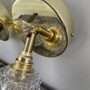 Pair of vintage electrified glass wall lamps