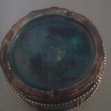 Ancient box in ceramic and enamel surrounded by brass