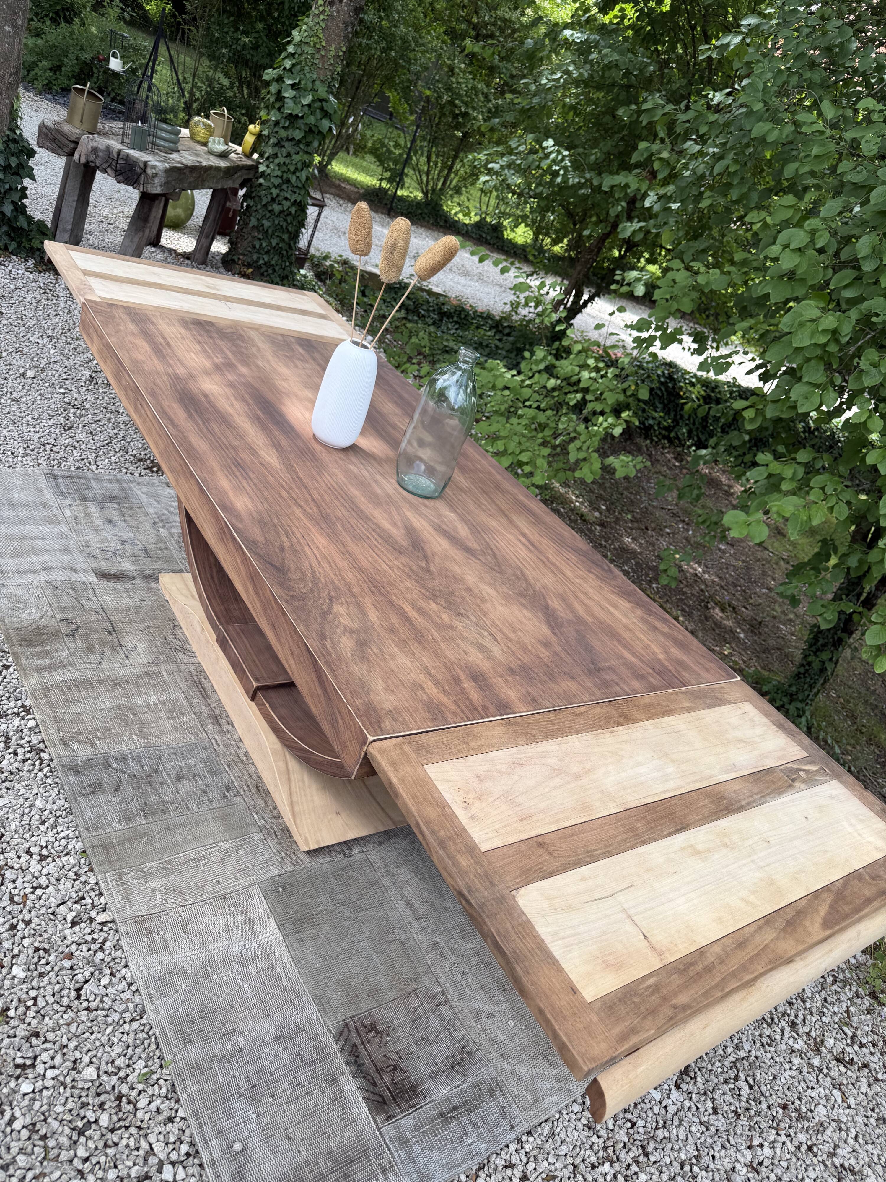 Renovated wooden table with extensions.