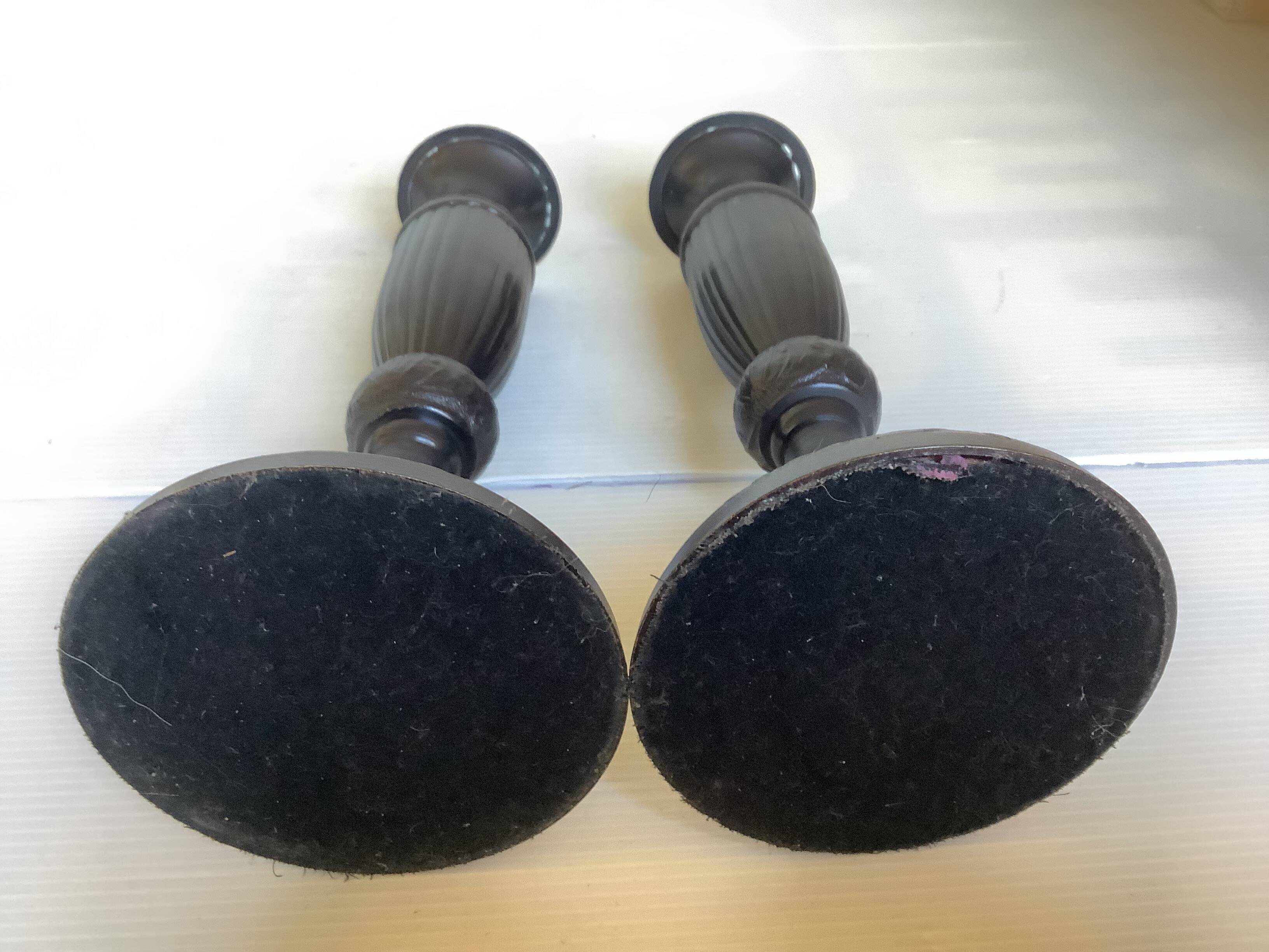 Pair of large black metal candlesticks