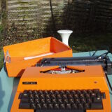 Electric writing machine adler orange and black with its suitcase