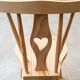 Rustic style chair in raw solid pine with heart.