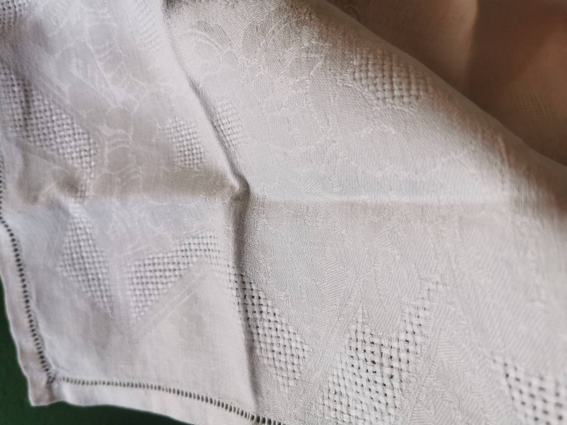 Set of 16 table napkins and an old floral damask tablecloth.