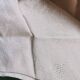 Set of 16 table napkins and an old floral damask tablecloth.