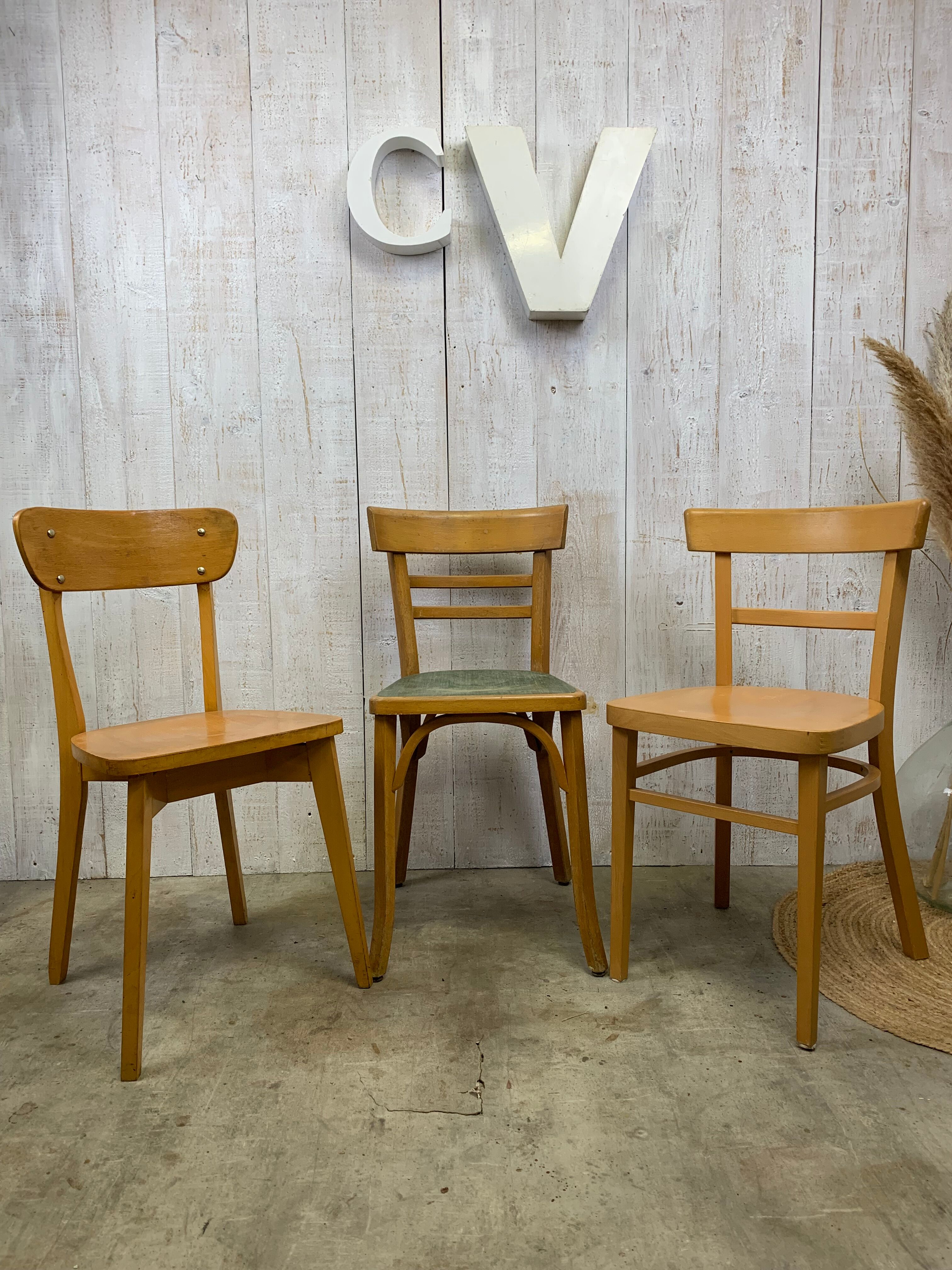 Lot 3 mismatched bistro chairs