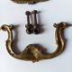 Antique pair of bronze drawer handles.