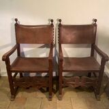 Paire fauteuils colonials cuir et bois sculpté