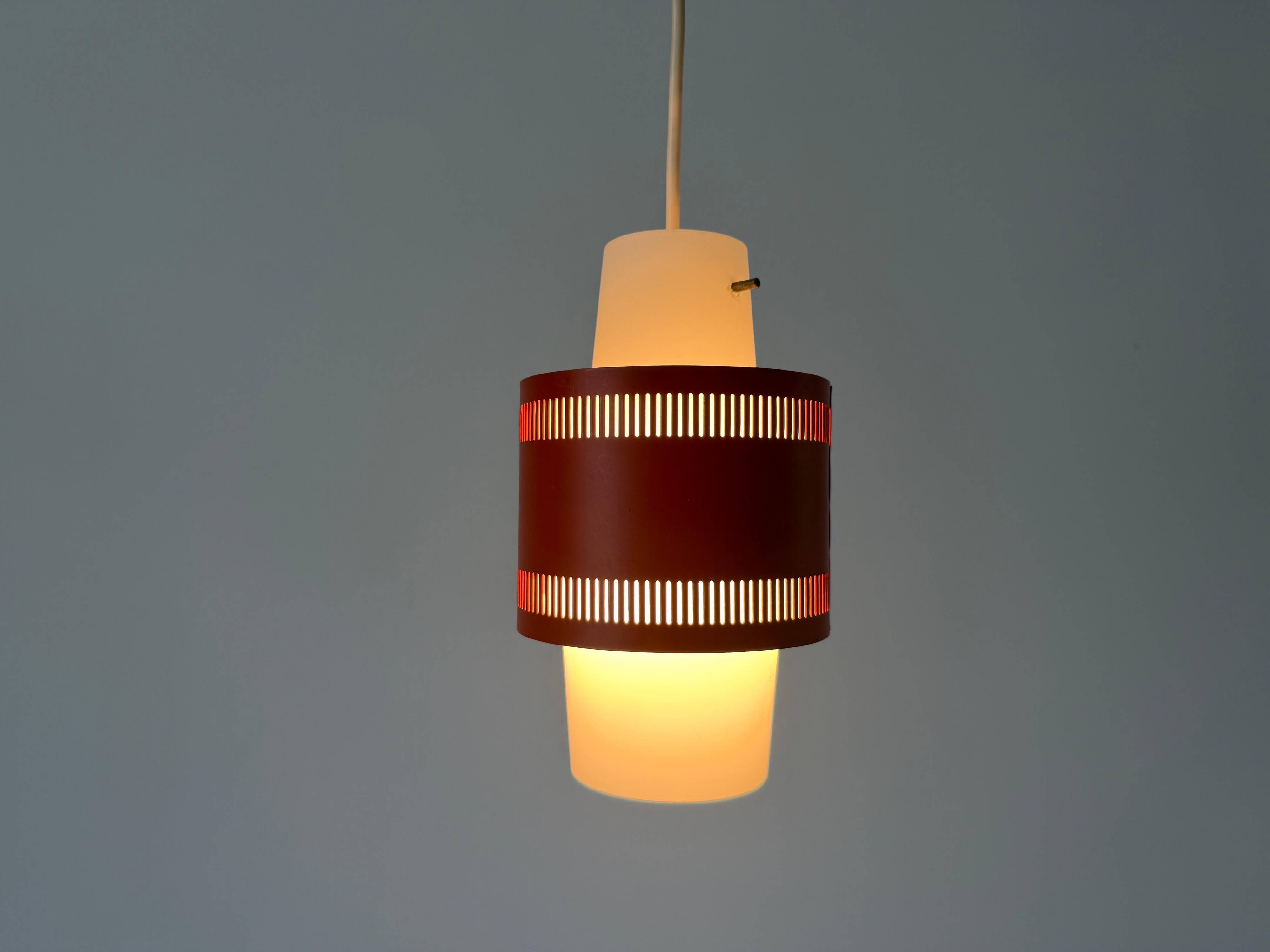 Glass ceiling light with an orange metal frame, 1960s, Germany.