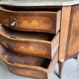 Curved chest of drawers in rosewood and marble marquetry