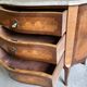 Curved chest of drawers in rosewood and marble marquetry