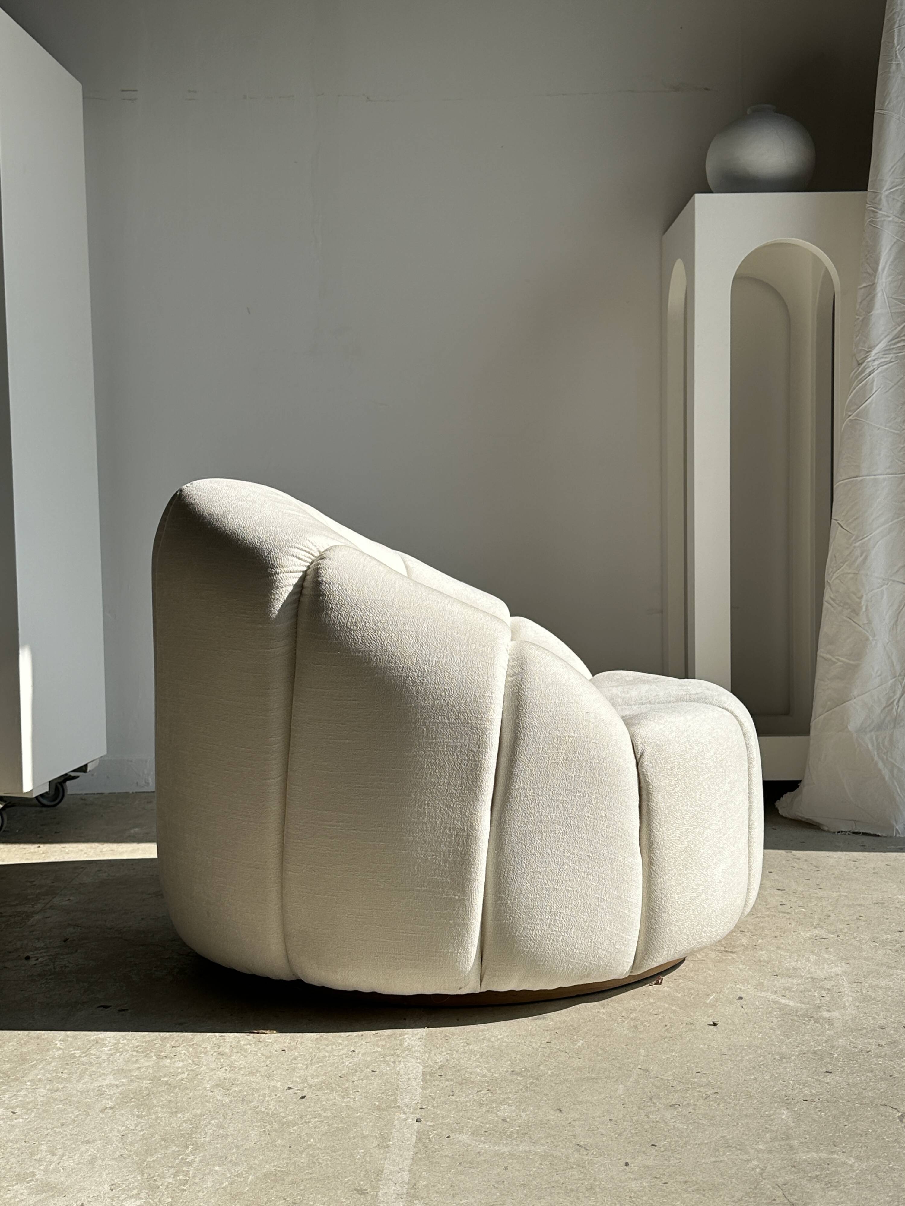 Large white circular armchair, white fabric upholstery
