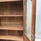 Walnut glazed bookcase with nineteenth century rose window
