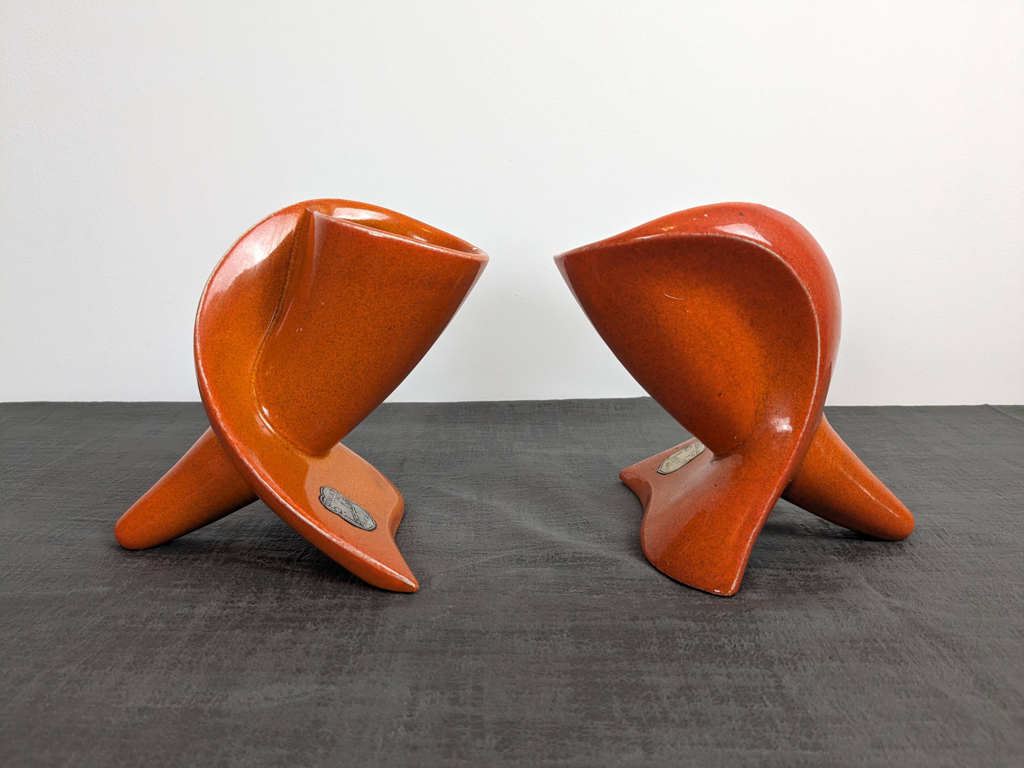 Pair of orange ceramic flower girls by Francis Lovas