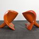 Pair of orange ceramic flower girls by Francis Lovas